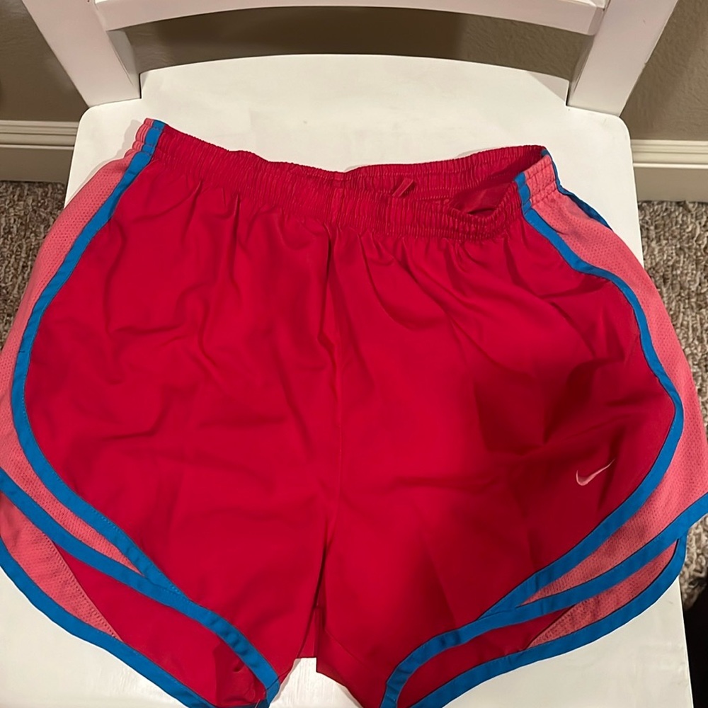 Hot pink Nike athletic shorts